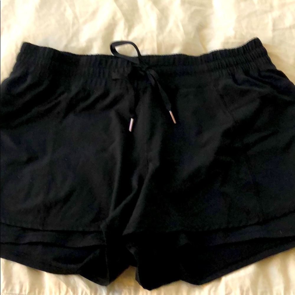 Calia black running shorts.